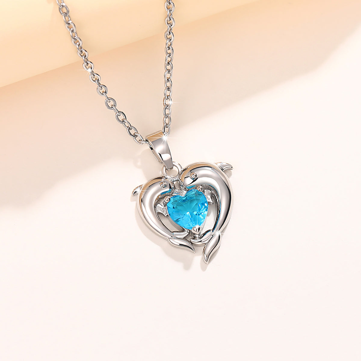 Dolphin Shaped Dazzling Blue Heart Necklace
